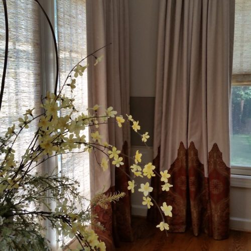 windows and rose drapes